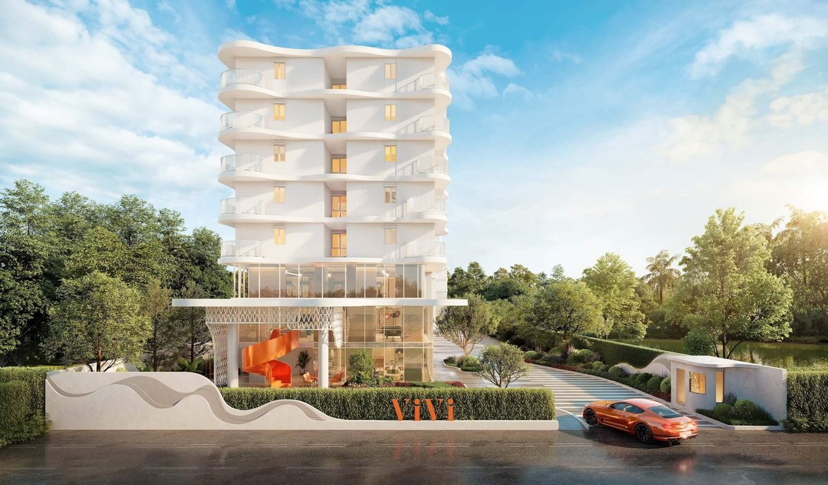 The Title Vivi — main entrance and the eight-storey building among the trees