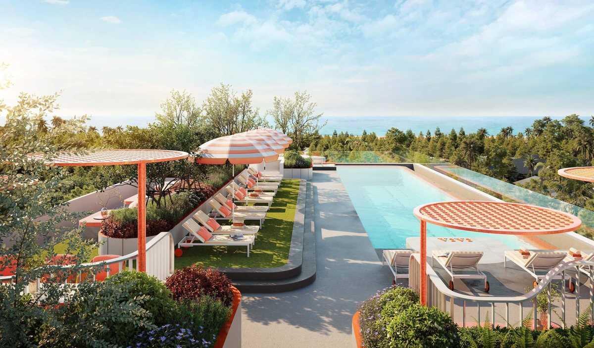 The Title Vivi — pool deck with sun loungers and umbrellas