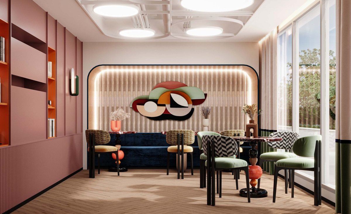 The Title Vivi — co-working space with a dining table and lounge